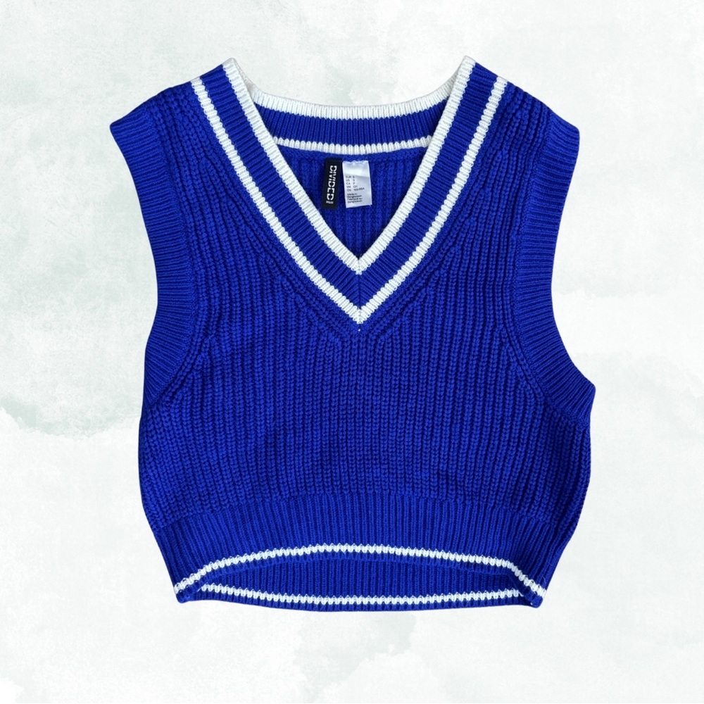 Blue sweater vest with white details, size small, worn once